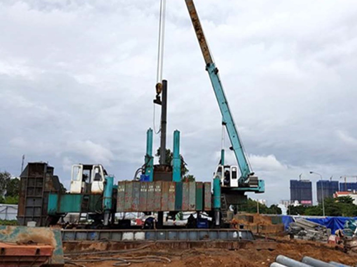 Ép cọc hố móng